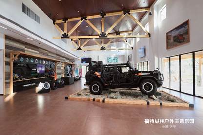 A black jeep inside a building  Description automatically generated