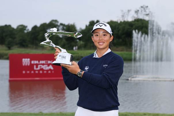 A person holding a trophy  AI-generated content may be incorrect.