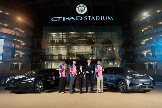 3. Players (Marmoush, Ait-Nouri, Guéhi) with Stella and both BYD cars